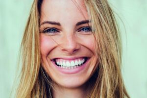 Portrait of young woman with beautiful smile
