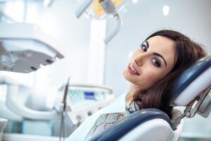 Dantist  working at patients teeth in clinic.  Close up portrait