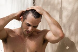 man_in_shower_getty_images_bob_thomas-_2_