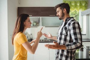 Couple having argument in kitchen