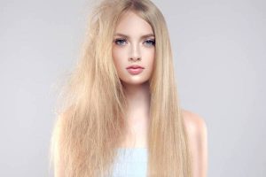 Portrait of model with hair in different state on head.