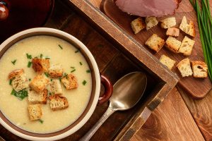 Beer soup with chicken fillet, ham and cheese.