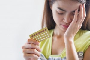 woman-hand-holding-contraceptive-panel-prevent-pregnancy_1150-14216