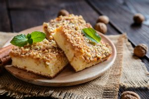 Fruit cake with apple and walnut topping
