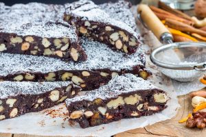Panforte italian christmas dessert with nuts and candied fruits, horizontal