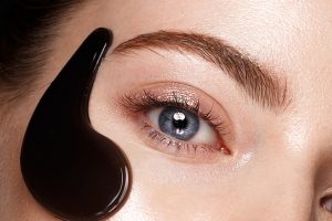 Beautiful fresh girl with cosmetic patches under the eyes, perfe