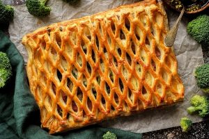 Chicken pie with broccoli from puff pastry top view